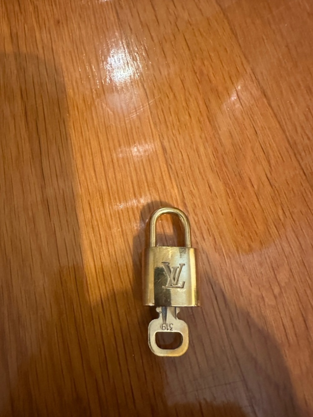 Louis Vuitton Gold-Tone LV Padlock and Key
